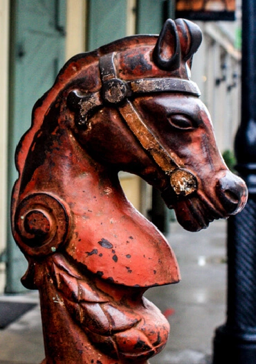 An antique horse post on a New Orleans street